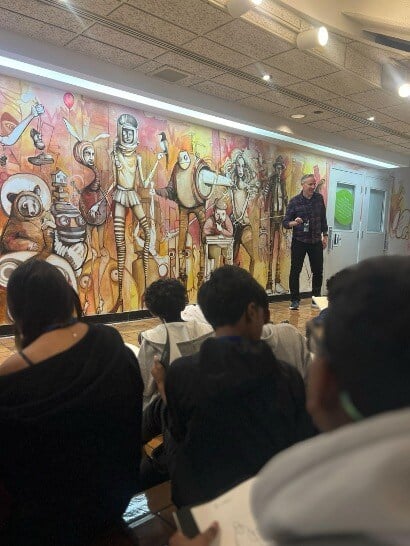 Aaron Coates walking the kids through a sketch of “the audience”